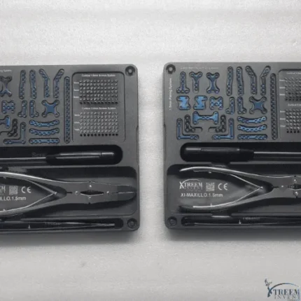 Two identical 1.5mm Cranio Maxillofacial implant system kits with blue titanium fixation plates and forceps side by side