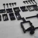 Close-up view of black anodized McCulloch lumbar retractor frame surgical blades and hooks by Xtreem Invent