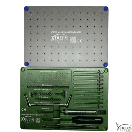 The Cranio Maxillofacial Implant System Kit – Precision Surgical Solution features green and silver surgical screws, plates, and tools organized in a tray with a labeled lid placed above.